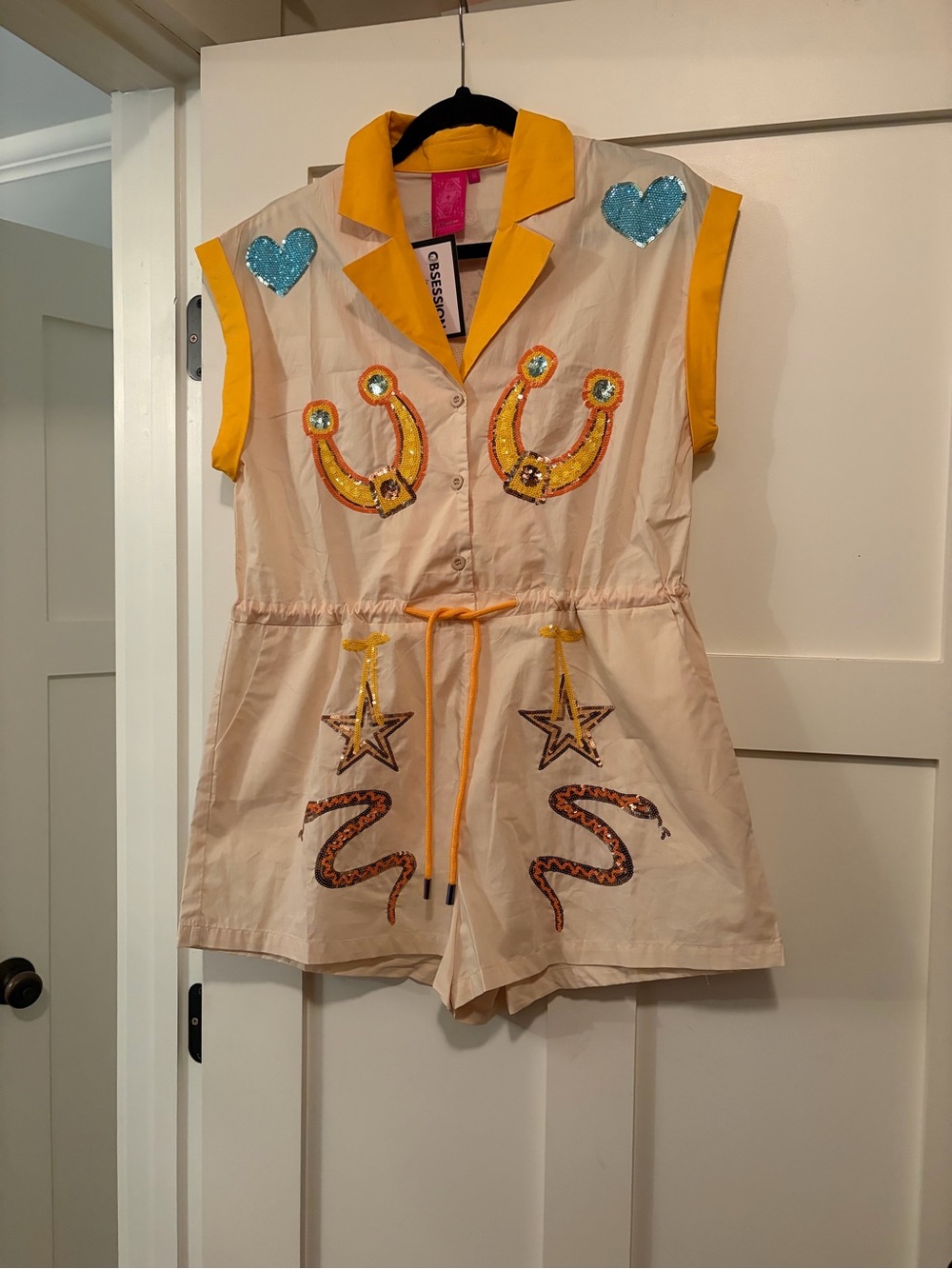 QUEEN OF SPARKLES Tan/Nude Romper with Yellow Trim & sequin Western accents! - Picture 3 of 5